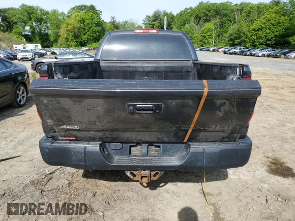 2014 Toyota Tundra SR z VIN 5TFUM5F14EX056119, wystawiony jako Copart lot #58779045 z przebiegiem 223 035 mil mil oraz Czysty tytuł • Clean title. Historia ofert i sprzedaży dostępna na DreamBid. Obrazek 6.