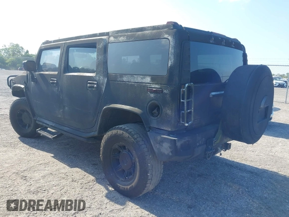 2003 Hummer H2 z VIN 5GRGN23UX3H140510, wystawiony jako IAAI lot #42325527 z przebiegiem 140 010 mil mil oraz . Historia ofert i sprzedaży dostępna na DreamBid. Obrazek 3.
