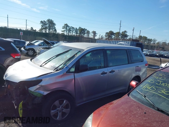 2014 Toyota Sienna L with VIN 5TDZK3DC8ES476153, listed as a IAAI auction lot 41462668 with 999,999 mi miles. Bid and sale history available at carsss.com. Image 13.