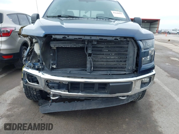 2015 Ford F-150 XLT with VIN 1FTEW1EG6FKD89143, listed as a IAAI auction lot 41640663 with 173,329 mi miles and . Bid and sale history available at carsss.com. Image 6.