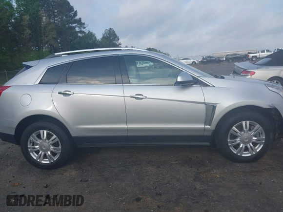 2015 Cadillac SRX Luxury Collection with VIN 3GYFNBE3XFS612048, listed as a IAAI auction lot 41923525 with 154,621 mi miles. Bid and sale history available at carsss.com. Image 13.