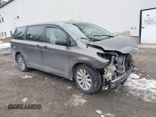 2014 Toyota Sienna L with VIN 5TDZK3DC9ES510214, listed as a IAAI auction lot 41721667 with 1 mi miles. Bid and sale history available at carsss.com. Image 1.