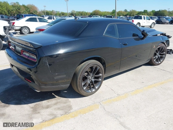2021 Dodge Challenger R/T Scat Pack Widebody with VIN 2C3CDZFJ0MH526642, listed as a IAAI auction lot 41732334 with 43,391 mi miles. Bid and sale history available at carsss.com. Image 4.