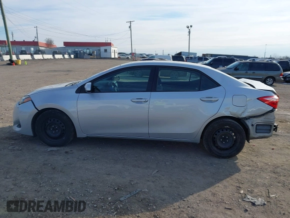 2019 Toyota Corolla L with VIN 2T1BURHE7KC223002, listed as a IAAI auction lot 41371130 with 251,534 mi miles and . Bid and sale history available at carsss.com. Image 15.