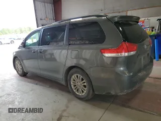2012 Toyota Sienna XLE AAS с VIN 5TDYK3DCXCS202381, выставлен на аукционе Copart как лот 59002895 с пробегом 272 415 миль миль и Списание • Salvage title. История ставок и продаж доступна на DreamBid. Изображение 2.