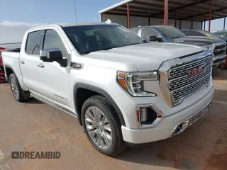 2022 GMC Sierra 1500 Limited Denali with VIN 3GTU9FEL1NG173980, listed as a IAAI auction lot 41569082 with 26,880 mi miles. Bid and sale history available at carsss.com. Image 1.