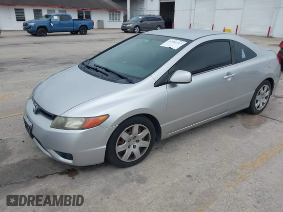 2006 Honda Civic Cpe LX with VIN 2HGFG12606H568106, listed as a IAAI auction lot 41983712 with 196,957 mi miles. Bid and sale history available at carsss.com. Image 17.