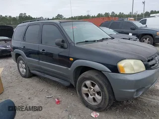 2002 Mazda Tribute LX with VIN 4F2YU08192KM35689, listed as a IAAI auction lot 41356009 with 217,866 mi miles and . Bid and sale history available at carsss.com. Image 1.