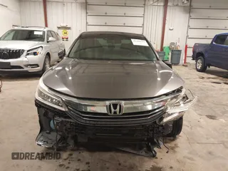2016 Honda Accord Touring with VIN 1HGCR3F92GA029435, listed as a IAAI auction lot 42180794 with 132,658 mi miles and . Bid and sale history available at DreamBid. Image 13.