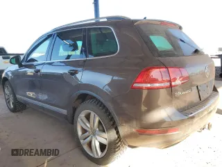 2012 Volkswagen Touareg Exec with VIN WVGEF9BP8CD008665, listed as a Copart auction lot 84611354 with 103,090 mi miles and Salvage Title. Bid and sale history available at DreamBid. Image 2.