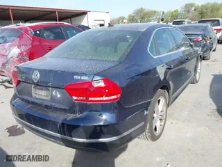 2013 Volkswagen Passat TDI SEL Premium with VIN 1VWCN7A33DC125396, listed as a IAAI auction lot 41862605 with 123,542 mi miles. Bid and sale history available at carsss.com. Image 4.