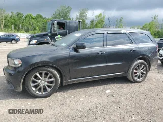 2014 Dodge Durango SXT with VIN 1C4RDJAG8EC428496, listed as a Copart auction lot 61367195 with 146,974 mi miles and Salvage title. Bid and sale history available at DreamBid. Image 1.