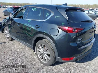 2019 Mazda CX-5 Grand Touring with VIN JM3KFBDM7K0525650, listed as a IAAI auction lot 42032757 with 65,530 mi miles and . Bid and sale history available at DreamBid. Image 3.