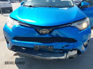 2018 Toyota RAV4 XLE with VIN JTMWFREV2JJ168557, listed as a IAAI auction lot 41994837 with 107,636 mi miles. Bid and sale history available at carsss.com. Image 6.
