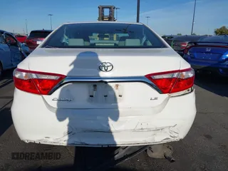 2015 Toyota Camry XLE with VIN 4T1BF1FK9FU923208, listed as a IAAI auction lot 42076970 with 124,096 mi miles and . Bid and sale history available at carsss.com. Image 16.