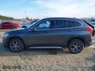 2018 BMW X1 xDrive28i with VIN WBXHT3C33J5F90349, listed as a IAAI auction lot 41385063 with 55,994 mi miles. Bid and sale history available at carsss.com. Image 15.