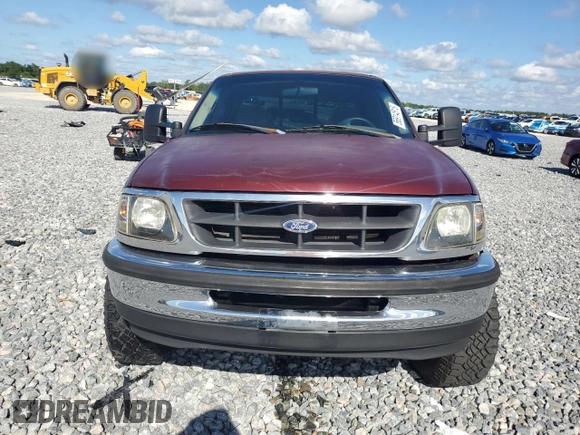 1998 Ford F-150 with VIN 1FTZX1763WNC22708, listed as a Copart auction lot 56914515 with 179,011 mi miles and Salvage title. Bid and sale history available at DreamBid. Image 5.