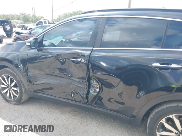 2019 Kia Sportage EX with VIN KNDPN3AC3K7543282, listed as a IAAI auction lot 42366436 with 86,928 mi miles and . Bid and sale history available at DreamBid. Image 6.