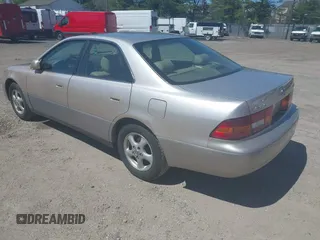 1998 Lexus ES 300 with VIN JT8BF28G6W5042042, listed as a IAAI auction lot 42000714 with 115,279 mi miles and . Bid and sale history available at DreamBid. Image 3.