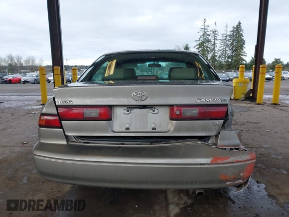 1998 Toyota Camry LE z VIN JT2BF28K1W0109514, wystawiony jako IAAI lot #41610102 z przebiegiem 161 266 mil mil oraz . Historia ofert i sprzedaży dostępna na DreamBid. Obrazek 16.