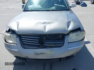 2003 Volkswagen Passat GLS z VIN WVWPD63B93P045100, wystawiony jako IAAI lot #42349064 z przebiegiem 173 929 mil mil oraz . Historia ofert i sprzedaży dostępna na DreamBid. Obrazek 6.