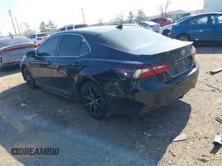 2021 Toyota Camry SE Nightshade with VIN 4T1G11AK1MU579561, listed as a IAAI auction lot 41674956 with 114,648 mi miles. Bid and sale history available at carsss.com. Image 3.