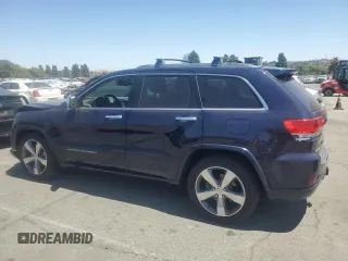 2015 Jeep Grand Cherokee Overland with VIN 1C4RJFCG0FC629863, listed as a Copart auction lot 63098475 with 92,426 mi miles and Salvage title. Bid and sale history available at DreamBid. Image 2.