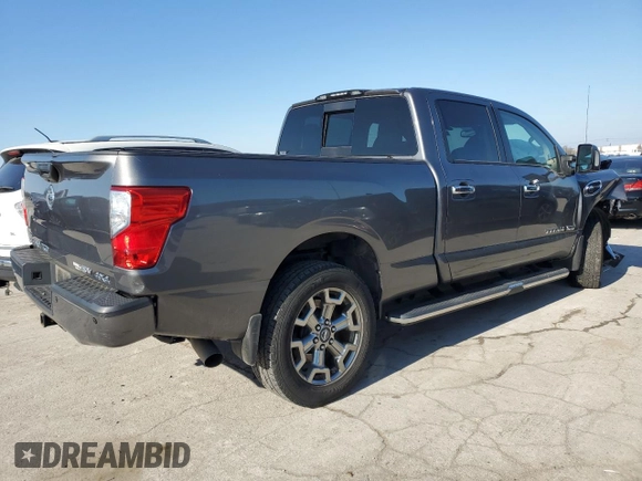 2019 Nissan Titan XD SL with VIN 1N6BA1F41KN511886, listed as a Copart auction lot 86123854 with 46,664 mi miles and Salvage Title. Bid and sale history available at carsss.com. Image 3.