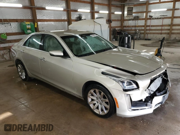 2014 Cadillac CTS Luxury AWD with VIN 1G6AX5S36E0190076, listed as a Copart auction lot 47609795 with 140,751 mi miles and Clean Title. Bid and sale history available at DreamBid. Image 4.