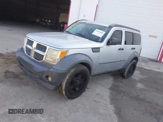 2007 Dodge Nitro SXT with VIN 1D8GT28K27W619313, listed as a IAAI auction lot 41917685 with 195,841 mi miles. Bid and sale history available at carsss.com. Image 2.