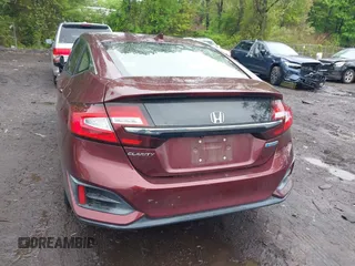 2018 Honda Clarity z VIN JHMZC5F12JC021958, wystawiony jako IAAI lot #42191071 z przebiegiem 29 423 mil mil oraz . Historia ofert i sprzedaży dostępna na DreamBid. Obrazek 16.