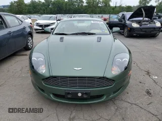 2005 Aston Martin DB9 z VIN SCFAD01A95GA02851, wystawiony jako Copart lot #63535783 z przebiegiem 40 729 mil mil oraz . Historia ofert i sprzedaży dostępna na DreamBid. Obrazek 5.