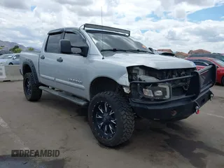 2014 Nissan Titan Pro-4X with VIN 1N6BA0EC7EN513116, listed as a IAAI auction lot 42193466 with 147,240 mi miles and . Bid and sale history available at DreamBid. Image 1.