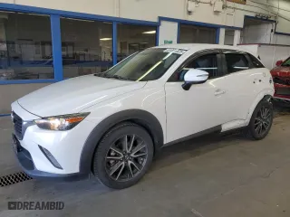 2017 Mazda CX-3 Touring with VIN JM1DKFC76H0148124, listed as a Copart auction lot 51866325 with NaN miles and Salvage Title. Bid and sale history available at carsss.com. Image 1.