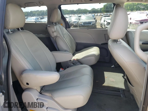 2011 Toyota Sienna LE AAS with VIN 5TDKK3DC8BS099367, listed as a Copart auction lot 56113655 with 182,851 mi miles and Salvage title. Bid and sale history available at DreamBid. Image 11.