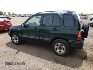 2003 Suzuki Vitara JLX z VIN 2S3TD52V136101732, wystawiony jako Copart lot #58477845 z przebiegiem 105 628 mil mil oraz Czysty tytuł • Clean title. Historia ofert i sprzedaży dostępna na DreamBid. Obrazek 2.
