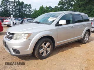 2012 Dodge Journey SXT z VIN 3C4PDCBG4CT189046, wystawiony jako IAAI lot #42410786 z przebiegiem 147 928 mil mil oraz . Historia ofert i sprzedaży dostępna na DreamBid. Obrazek 2.