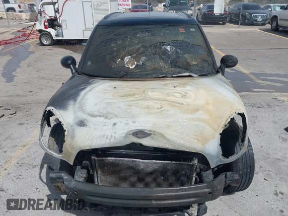 2014 MINI Countryman S with VIN WMWZC3C55EWP25697, listed as a IAAI auction lot 41797132 with Not Provided miles and . Bid and sale history available at DreamBid. Image 6.