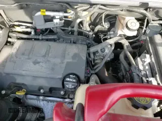 2021 Chevrolet Trax LS z VIN KL7CJNSB0MB351908, wystawiony jako Copart lot #80496125 z przebiegiem 75 349 mil mil oraz Szkoda całkowita • Salvage title. Historia ofert i sprzedaży dostępna na DreamBid. Obrazek 14.