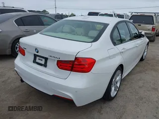 2014 BMW 3 Series 328d xDrive with VIN WBA3D5C50EKX96327, listed as a IAAI auction lot 42050971 with 163,785 mi miles. Bid and sale history available at carsss.com. Image 4.