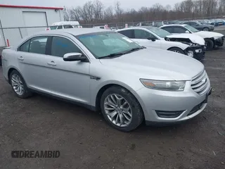 2014 Ford Taurus Limited with VIN 1FAHP2F81EG123933, listed as a IAAI auction lot 41843301 with 111,629 mi miles. Bid and sale history available at carsss.com. Image 1.