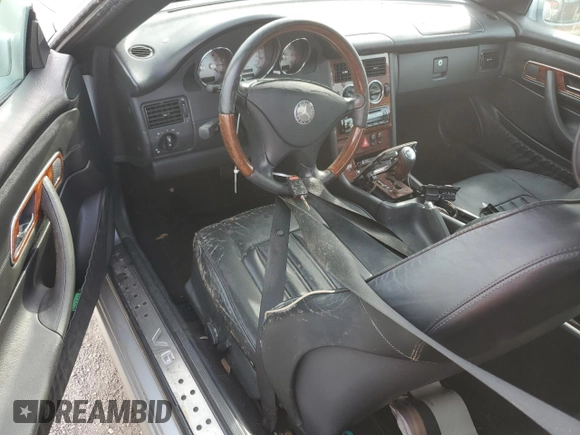 2004 Mercedes-Benz SLK-Class with VIN WDBKK65F54F304252, listed as a Copart auction lot 74955804 with 0 mi miles and Salvage Title. Bid and sale history available at carsss.com. Image 8.