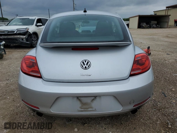 2012 Volkswagen Beetle with VIN 3VWV67AT7CM643899, listed as a Copart auction lot 54127995 with Not Provided miles and Salvage Title. Bid and sale history available at DreamBid. Image 6.
