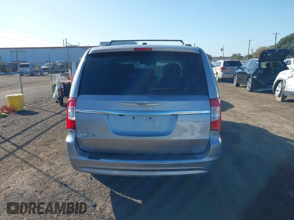 2014 Chrysler Town & Country Touring with VIN 2C4RC1BGXER270140, listed as a IAAI auction lot 41068771 with 144,820 mi miles. Bid and sale history available at carsss.com. Image 16.