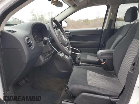 2014 Jeep Compass Sport with VIN 1C4NJDBB9ED641754, listed as a Copart auction lot 52806165 with 76,100 mi miles and Clean Title. Bid and sale history available at carsss.com. Image 7.