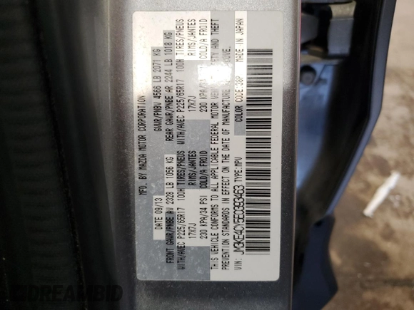 2014 Mazda CX-5 Touring z VIN JM3KE4CY5E0393463, wystawiony jako Copart lot #57776665 z przebiegiem 91 565 mil mil oraz Szkoda całkowita • Salvage title. Historia ofert i sprzedaży dostępna na DreamBid. Obrazek 12.
