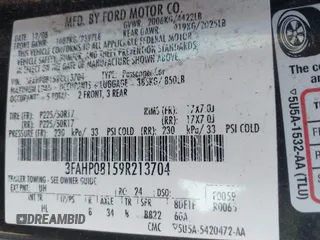 2009 Ford Fusion SEL with VIN 3FAHP08159R213704, listed as a IAAI auction lot 41988480 with 277,803 mi miles. Bid and sale history available at carsss.com. Image 9.