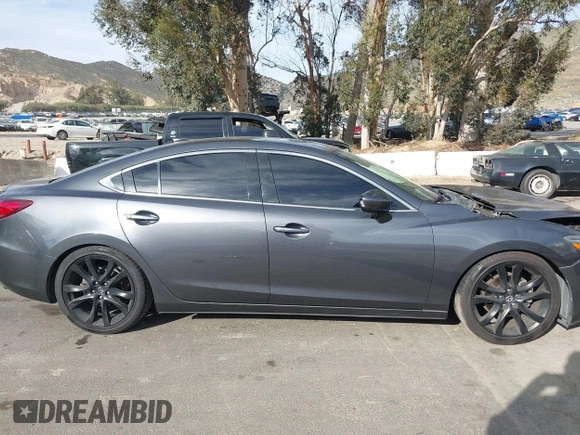2016 Mazda Mazda6 i Grand Touring with VIN JM1GJ1W57G1441102, listed as a IAAI auction lot 41687057 with 144,876 mi miles. Bid and sale history available at carsss.com. Image 13.
