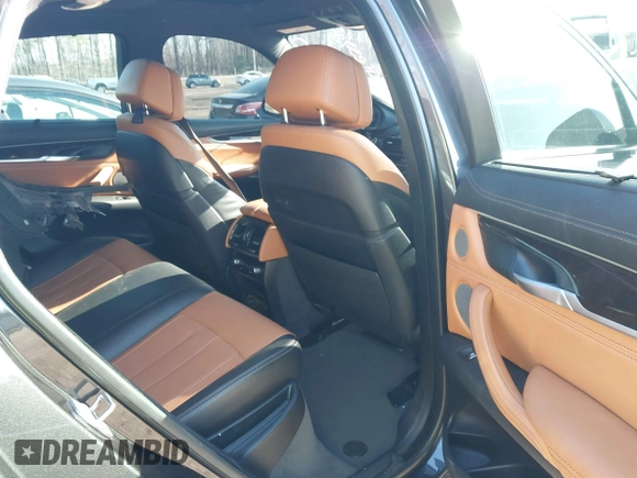 2019 BMW X6 xDrive35i z VIN 5UXKU2C51K0Z64589, wystawiony jako IAAI lot #41537380 z przebiegiem 60 769 mil mil oraz . Historia ofert i sprzedaży dostępna na DreamBid. Obrazek 8.