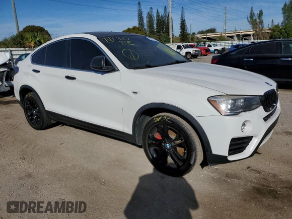 2015 BMW X4 xDrive28i with VIN 5UXXW3C57F0M88974, listed as a Copart auction lot 36212923 with 138,948 mi miles. Bid and sale history available at carsss.com. Image 4.